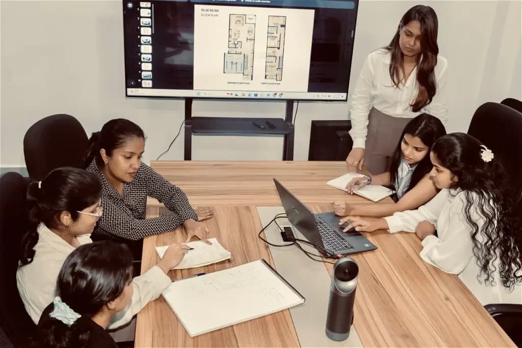 Scaleup Smart team reviewing construction drawings